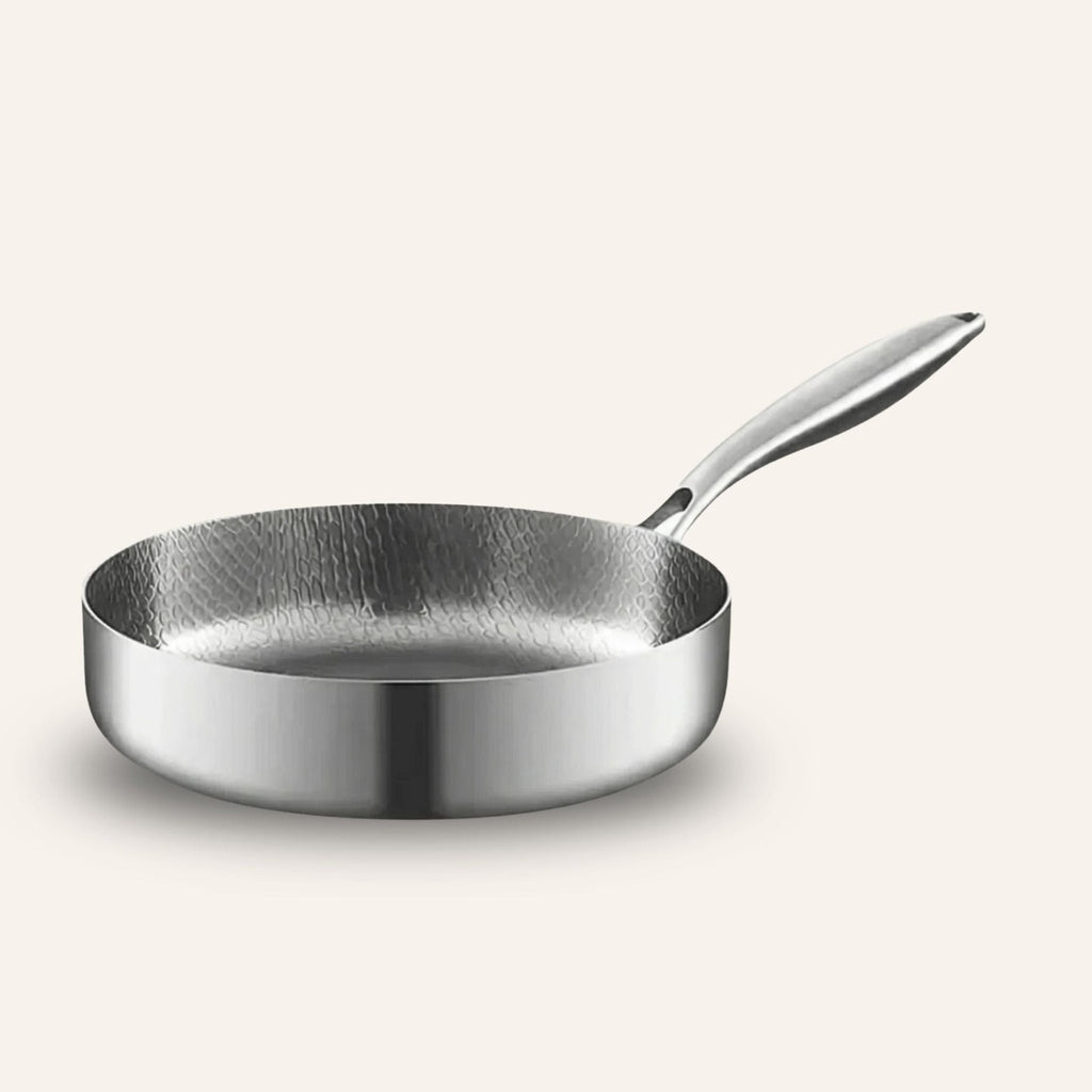 Complete cookware set featuring pots, pans, utensils, and a cutting board for everyday cooking, meal preparation, and versatile kitchen use.