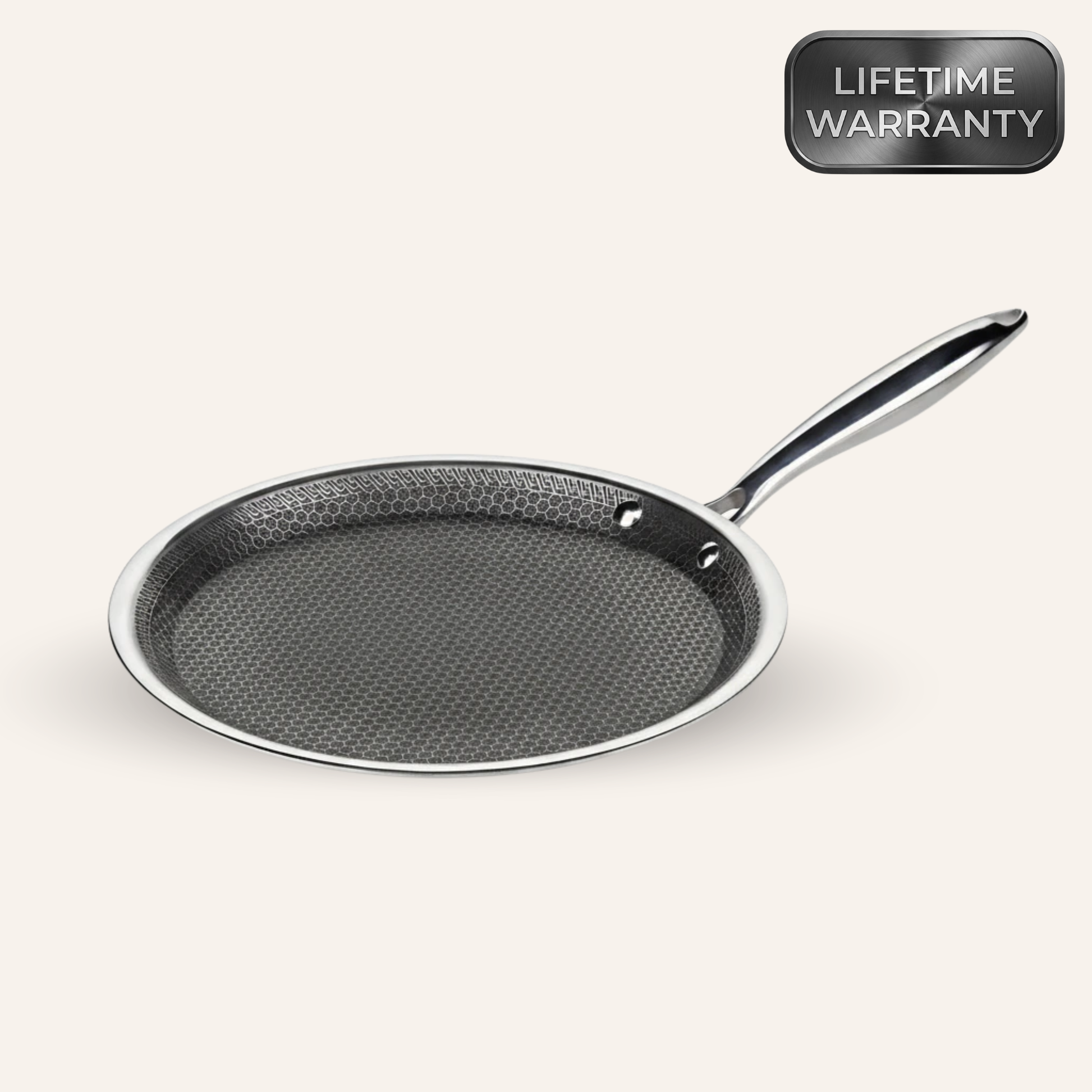 Crêpe pan with honeycomb surface and low-profile design, ideal for making crêpes, pancakes, and eggs on all cooktops including induction.