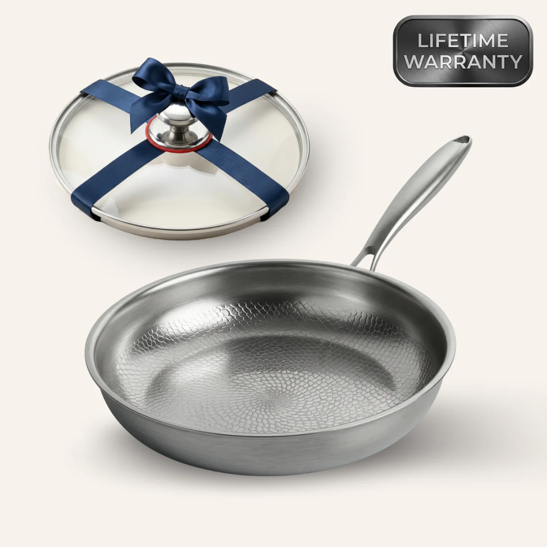 Frying pan with fitted lid and honeycomb surface, designed for searing, steaming, braising, and everyday cooking on all cooktops.